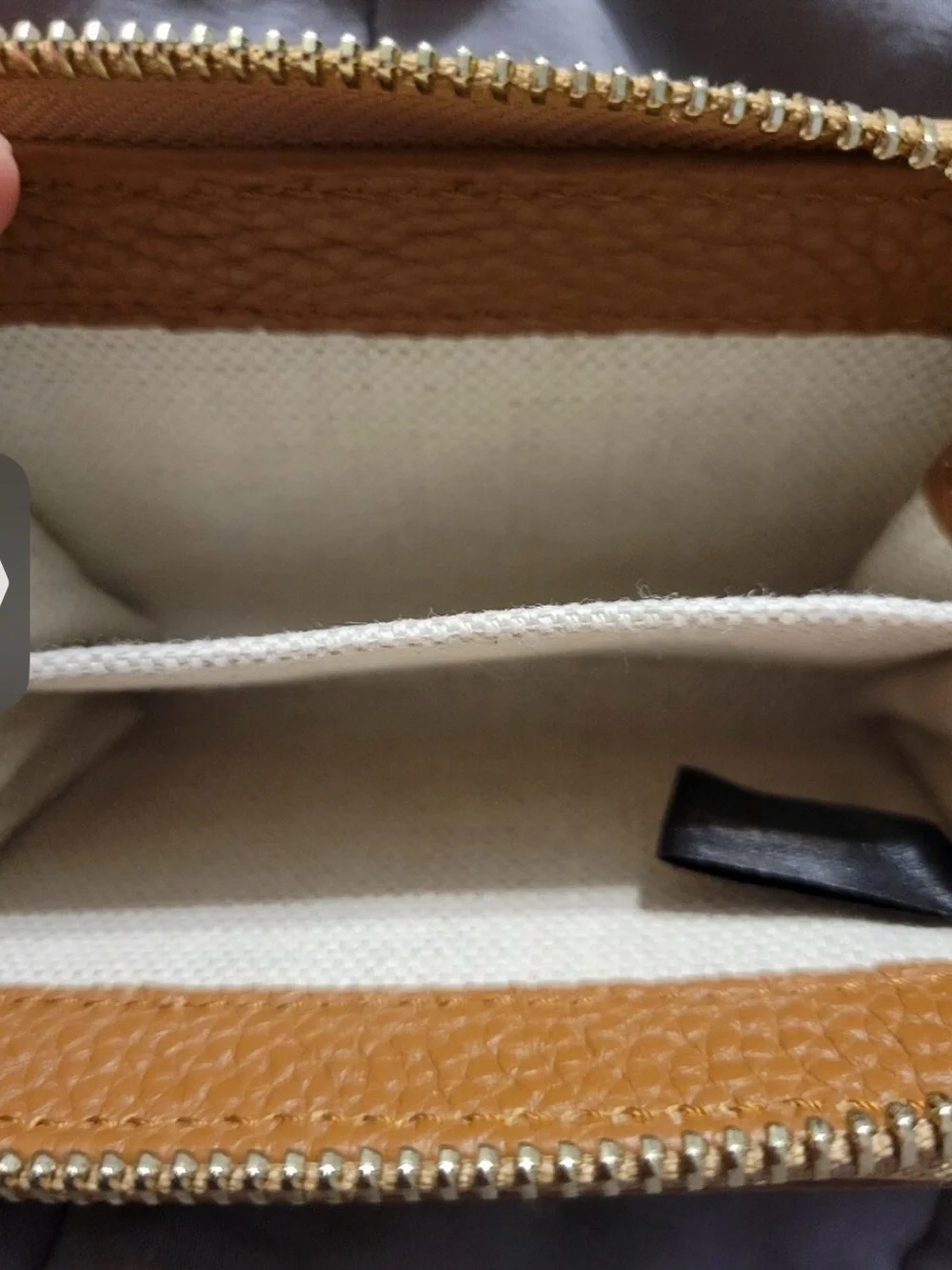 Dooney & Bourke Tan and Cream Pebbled Leather Zip Wallet